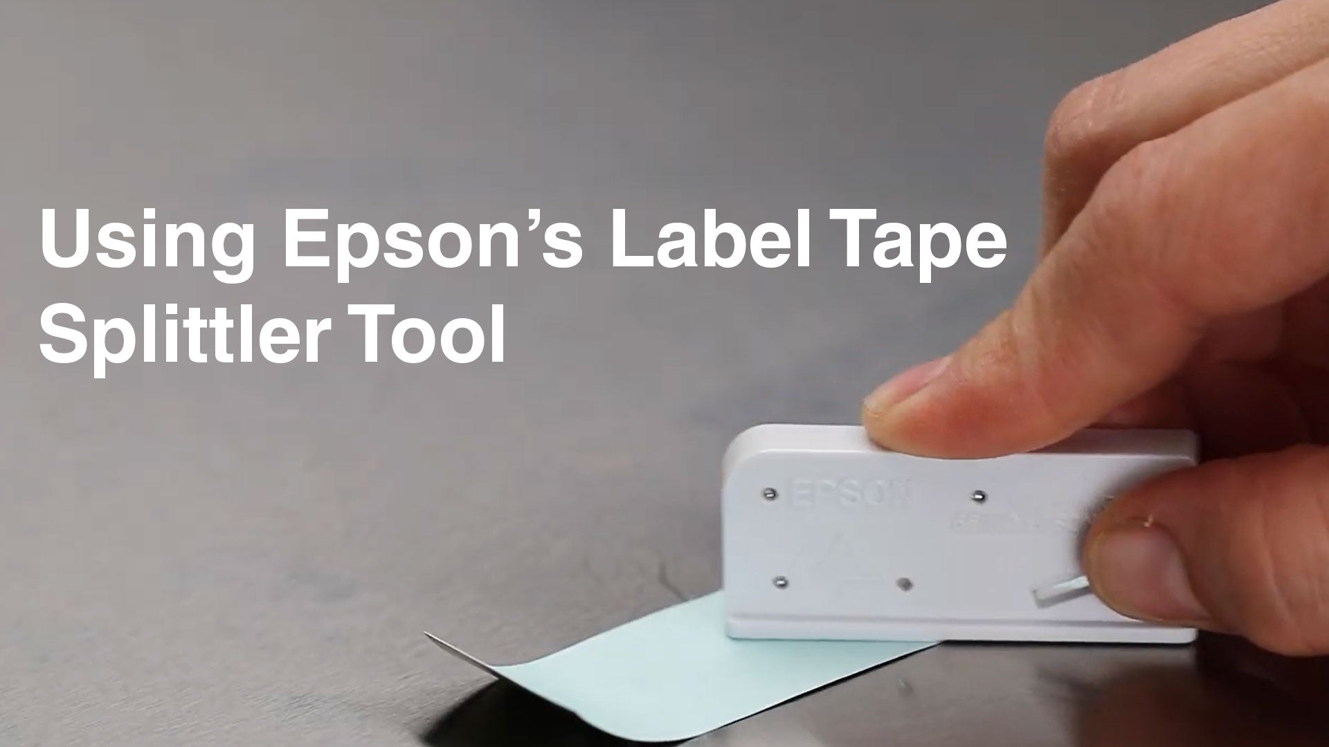 Load video: Epson LabelWorks Manual Tape Splitter